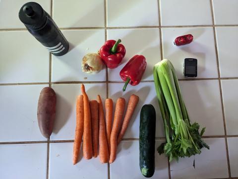 vegetables, a bike computer, and a water bottle