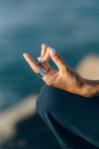 Close Up Shot of the hand of a Person Meditating